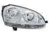 VW Фара основна галоген з мотором,без ламп H7/H7 PY21W W5W лів.Golf V,Jetta III 04- HELLA 1EG 247 007-571 (фото 1)