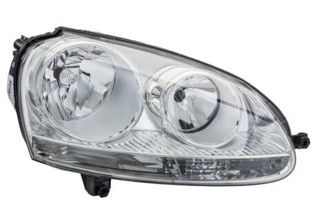 VW Фара основна галоген з мотором,без ламп H7/H7 PY21W W5W лів.Golf V,Jetta III 04- HELLA 1EG 247 007-571