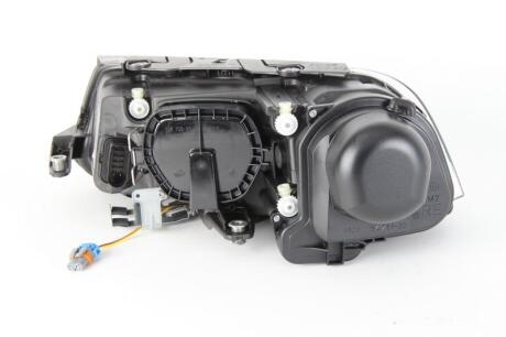 VW Фара основна Bi-Xenon з мотором,без газор.лампи,з лампами накал.D2S/H7 PY21W W5W прав.Passat 00- HELLA 1EL 008 340-081