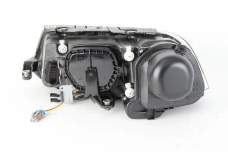 VW Фара основна Bi-Xenon з мотором,без газор.лампи,з лампами накал.D2S/H7 PY21W W5W прав.Passat 00- HELLA 1EL 008 340-081 (фото 1)